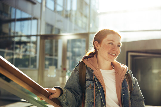 Confident female student in college