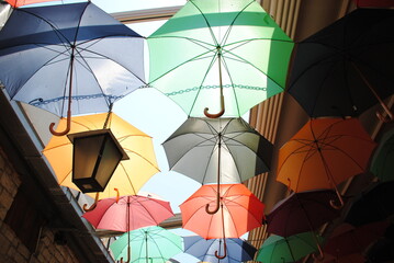 Fototapeta na wymiar Limassol, Cyprus - 07.08.2018: Umbrellas in Limassol center street.