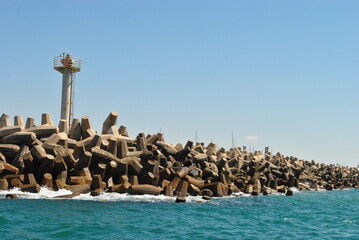 Harzliya city harbor, boating area, and vacation resort in the center of Israel. The breakwater that protects the yacht harbor from storms. Marina.