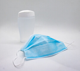 Face mask and plastic hand sanitizer