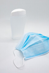 Face mask and plastic hand sanitizer