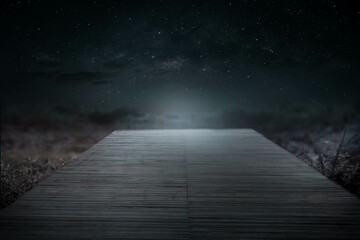 Beautiful wooden bridge at night