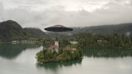 Flying Saucer ufo Over church in small island and fly away
Aerial view from Bled lake Church...
