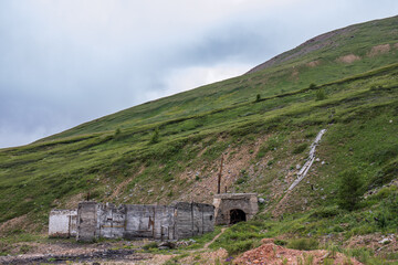 The building of the old abandoned mercury of the mine in the Altai Republic. Old brick building of...