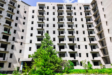 Abandoned high-rise buildings, city. Clean quarts and buildings without windows or doors.