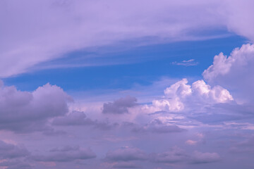 Beautiful sky background with tiny clouds. The softness of the cloud creates a feeling of relaxation, Warm Colours, Copy space, No focus, specifically.