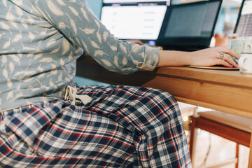 Woman working from home dressed pajama