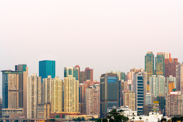 Skyline of tall residential skyscrapers of apartments in Hong Kong.