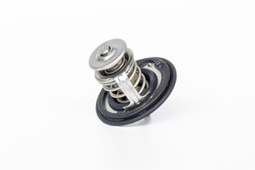 Old and reuse Car thermostat water on white background use for background and texture in repair concept car