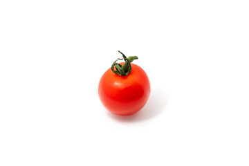 Shiny red organic tomato isolated on white background