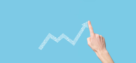 Hand hold drawing on screen growing graph, arrow of positive growth icon.pointing at creative business chart with upward arrows.Financial, business growth concept.