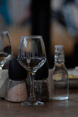 Wine glass on the dinner table. Liquid concept design. Wine tasting– wine degustation set. 