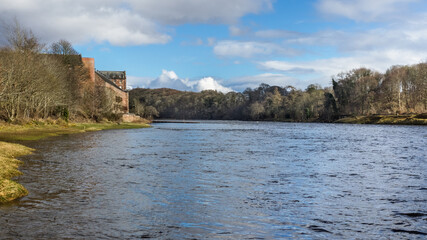 Fototapeta na wymiar River Tay at Stanley Mills in Perthshire, Scotland an area of the river well known for salmon fishing