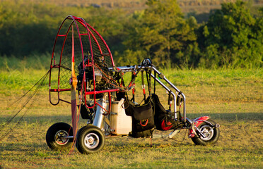 paramotor cart parked on the park's lawn