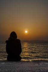 Fototapeta premium silhouette of a person at sunset