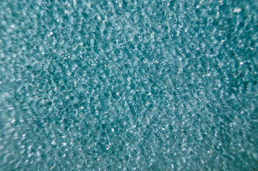 Obraz premium Background of light blue green aqua stained glass