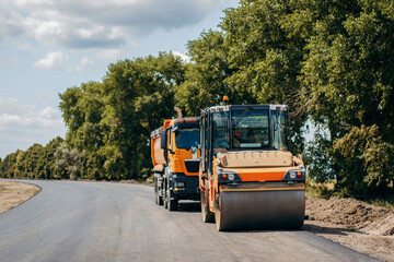 Fototapeta premium Road service repairs the highway