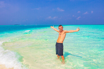 Russian tourist vacation on island Madivaru Finolhu Rasdhoo Atoll Maldives.