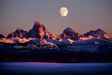 Sunset Light Alpen Glow on Tetons Teton Mountains wtih Moon Rising