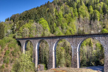 Fototapeta na wymiar The 37 m high and 224 m long Ravenna Bridge is a viaduct of the Höllental Railway and the successor to the bridge built in 1887.