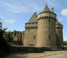 Fototapeta na wymiar Exterior views of the castle of Suscinio: towers and moat, in Sarzeau in Morbihan, next to the Atlantic Ocean, in Brittany, France