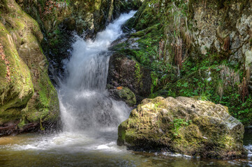 The wild mountain stream of Ravenna in the Black Forest flows over several waterfalls and cascades into the Ravenna Gorge, which is a popular excursion and hiking area in southwestern Germany.