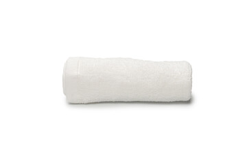 White fluffy cotton towel isolated on a white background.