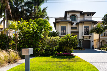 Bonita Springs, Florida gulf of mexico coast with mailbox at luxury villa mansion house modern...