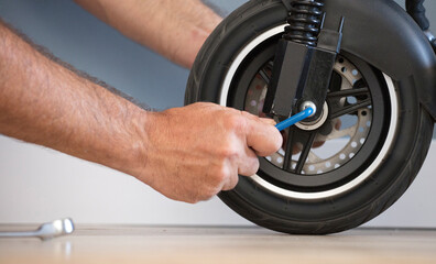 Electric motorcycle maintenance service concept. Repair service. Technological concept.
