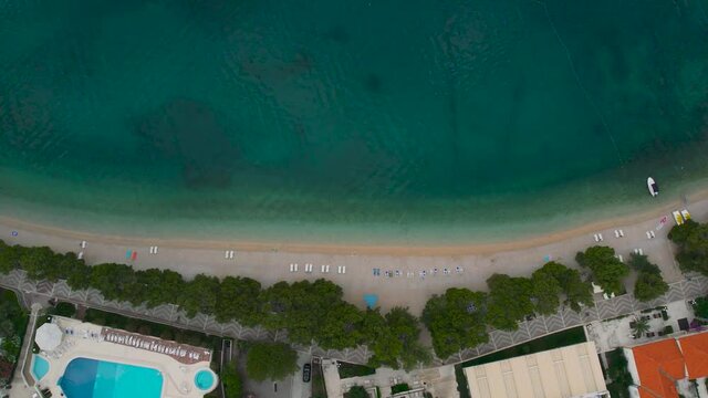 CROATIA - july 2021 - Beautiful aerial over the Tucepi coast, Makarska riviera in the morning. top view