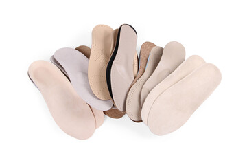 Isolated orthopedic insole on a white background. Treatment and prevention of flat feet and foot diseases. Foot care, comfort for the feet. Wear comfortable shoes. Medical insoles.