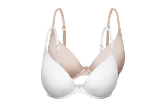 White and beige female bras isolated on a white background. Compression bra for breast. Breast support band. Closeup of elegant black push up woman underwear. Basic classic cotton everyday bra
