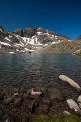 Lower Ibon Azul, blue lake with Pico de las Marmoleras (2.907 m) in the background, Tena valley,Baños de Panticosa, Pyrenees, Huesca, Spain.