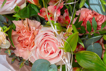Details of a pink rose bouquet.