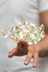 bill euro banknote in hand rain