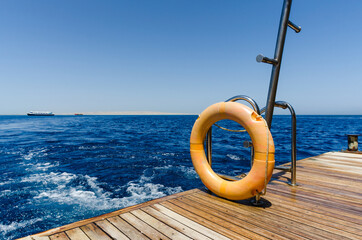 view from the ship to the coast of the Red Sea and blue water