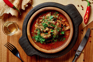 Georgian dish Chashushuli, spicy veal stewed in tomato gravy