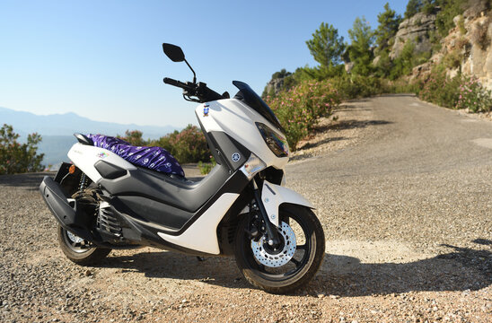 Turkey, Kemer 18.07.2021:Scooter white Yamaha NMAX 155 model 2020. The scooter is parked in the mountains of Turkey. 
