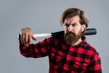 bearded male hipster in checkered shirt hold sport bat, baseball
