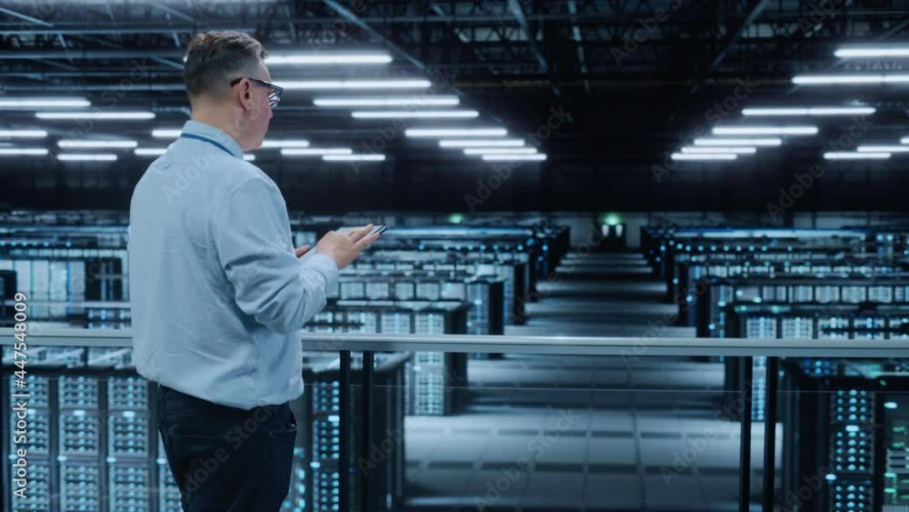 Poster Data Center Engineer Using Laptop Computer. Server Farm Cloud Computing Specialist Facility with Adult Male System Administrator Working with Data Protection Network for Cyber Security.