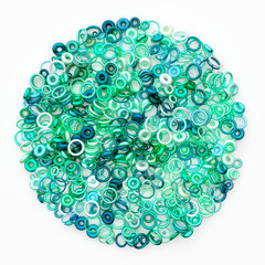 3d render of abstract art 3d ball circle based on small and big artistic ring particles in plastic glass and metal material in emerald green azure blue and white gradient color on white background