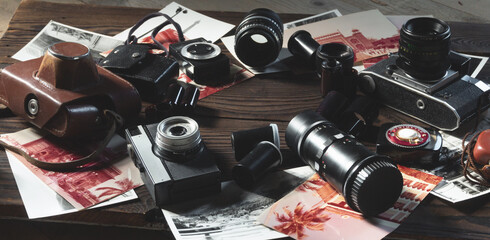 Old outdated cameras, lenses and exposure meters