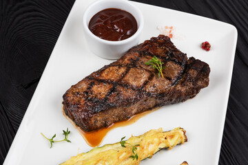 Grilled black angus steak New York