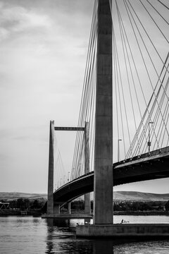 Black and white photo of cable bridge over Columbia River in Washington State
