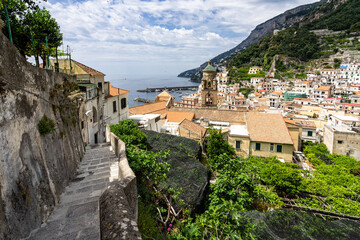Fototapeta na wymiar Scenic panoramic pathway descending to Amalfi, the most charming town of Amalfi coast, Italy