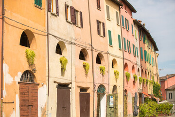 Brisighella, Ravenna, Emilia-Romagna, Italy. Close up central street Via del Borgo or Via degli Asini (Donkey Road), a flyover mostly covered with various types of arches.