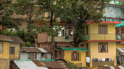 Facades of residential buildings on McLeod Ganj streets
