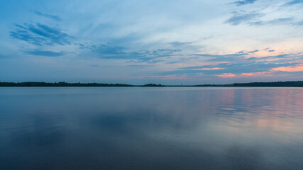 Fototapeta na wymiar Calm water surface at the Markkleeberger Lake near Leipzig