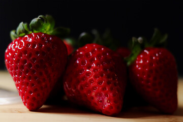 strawberries on a wooden table