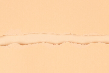 Beige torn paper background with clipping path